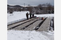 Коммунист-депутат Н. Харитонов помогает строительству моста в Лабинском районе